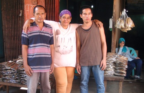 Nurdaya Sakili 5 - with husband & son in their dried fish store